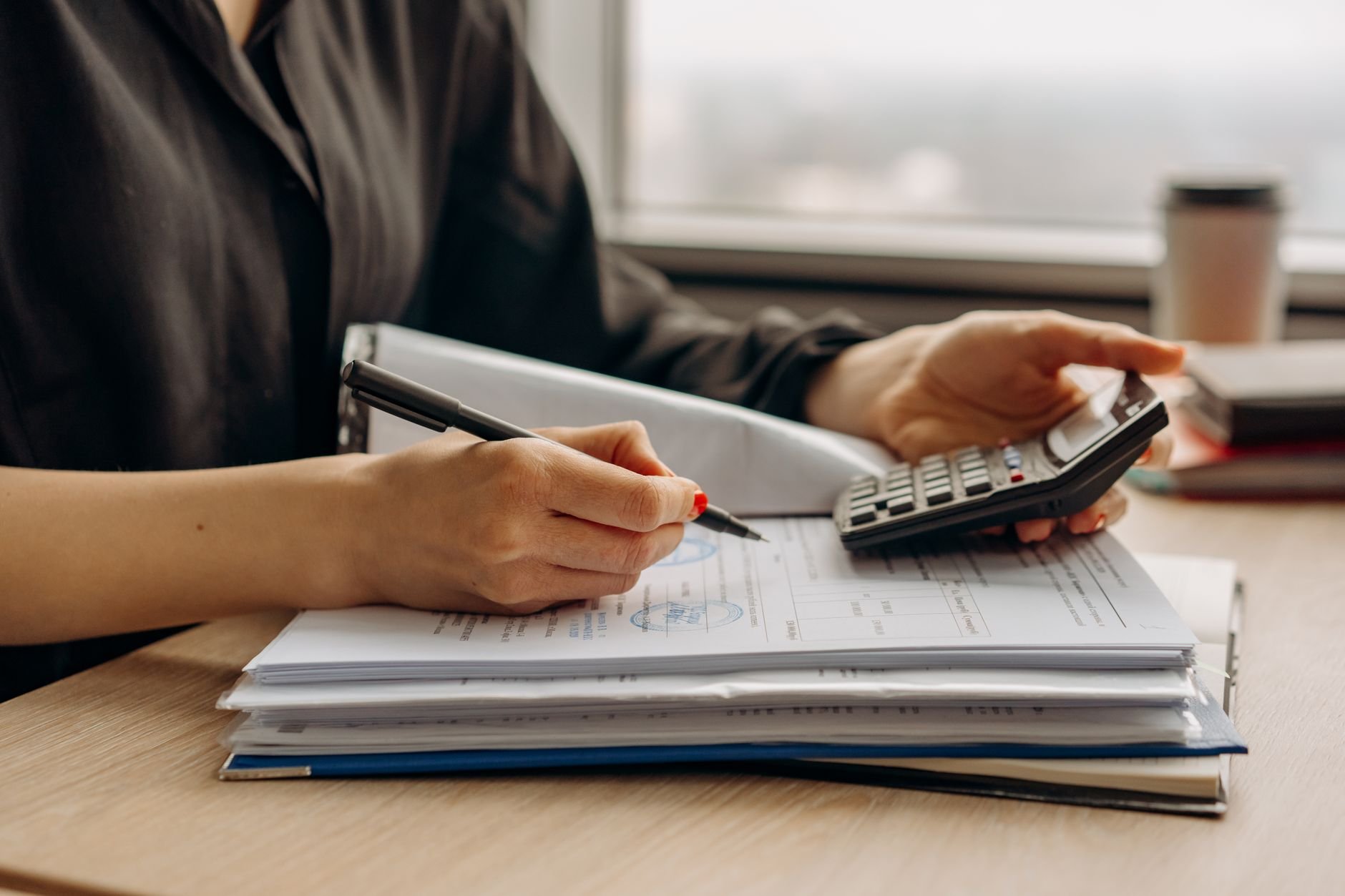 Person reviewing financial documents
