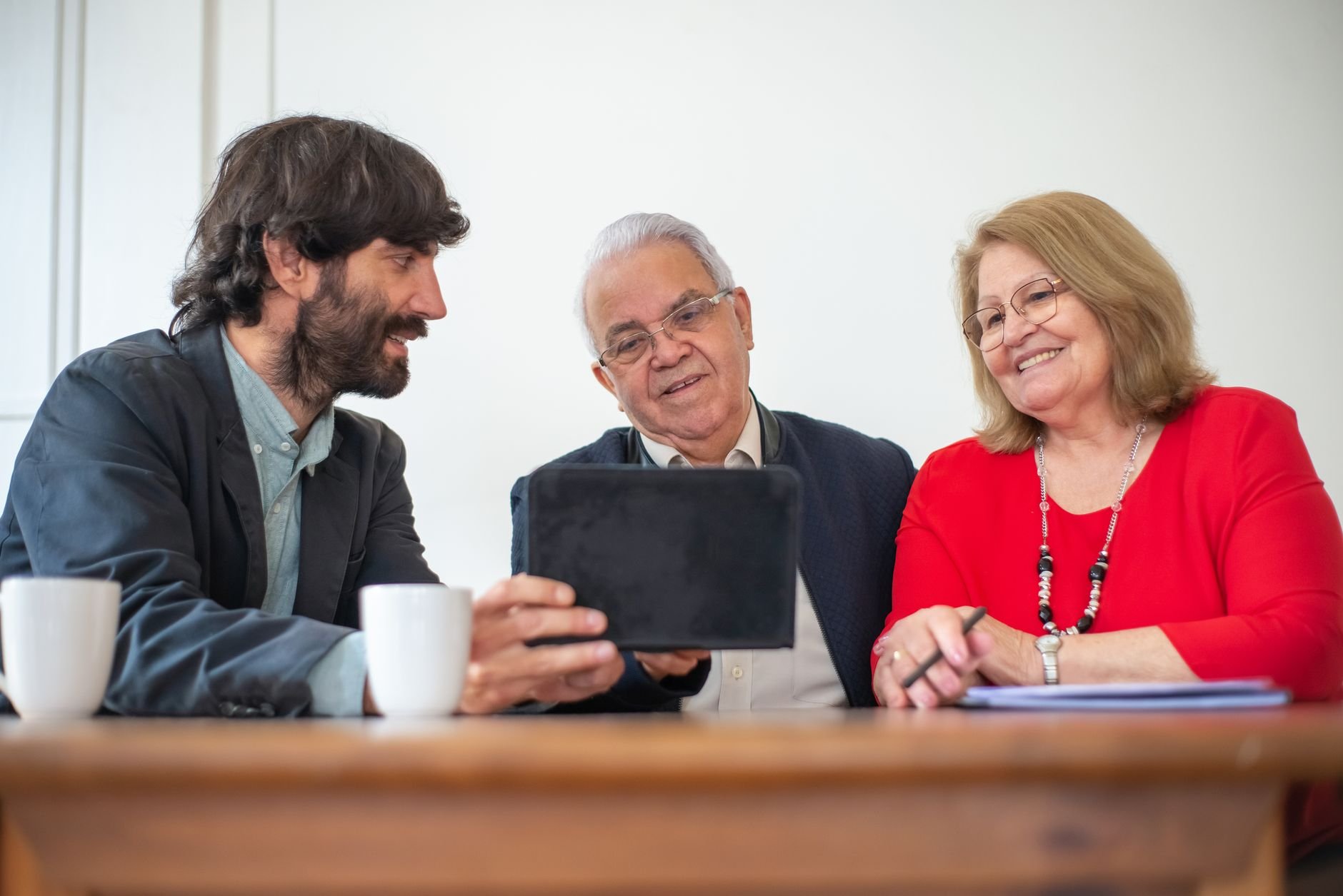 Elderly couple in a meeting with a financial consultant